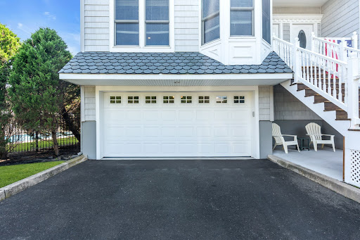 House facade with white garage - Apartment / penthouse purchase in Point Pleasant Beach, 4 bedrooms