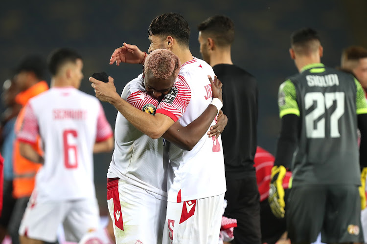 Wydad Athletic players celebrate after reaching the Caf Champions League final following Friday's 1-1 (4-2 aggregate) draw with Petro Atletico held at the Mohamed V Stadium in Morocco.