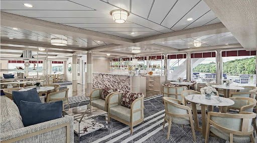 The main lounge of the catamaran-style American Legend, launching in 2024.