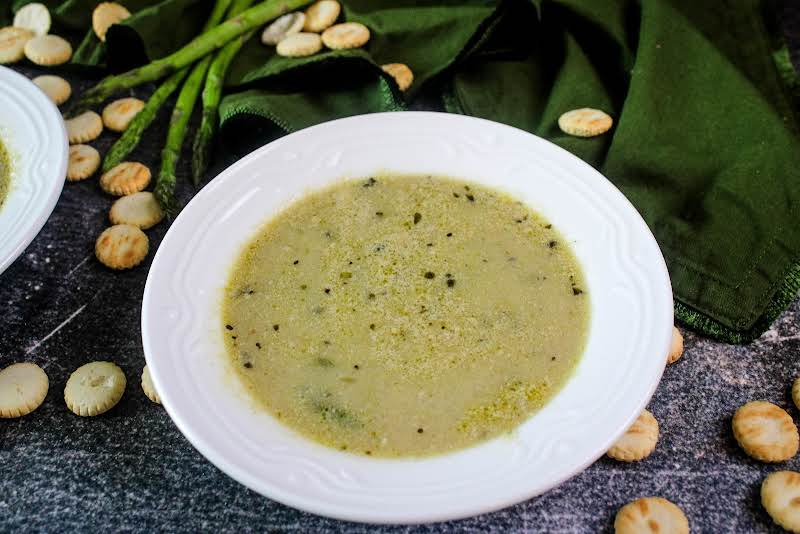 A Bowl Of Creamy Vegan Asparagus Soup.