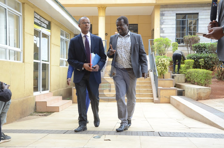 Lawyer Philip Murgor and Busia senator Okiya Omtatah arriving at Milimani Law Courts for presidential petition hearing on Tuesday, August 30, 2022.