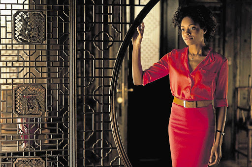 Naomie Harris, a 007 aide in 'Skyfall', shaves Craig