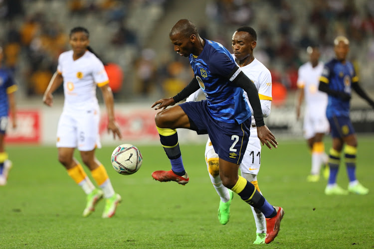 Cape Town City captain Thamsanqa Mkhize takes the ball away from Khama Billiat of Kaizer Chiefs during the DStv Premiership match between Cape Town City FC and Kaizer Chiefs.