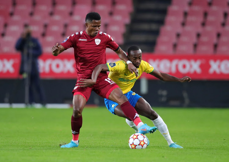 Peter Shalulile of Mamelodi Sundowns challenged by Rodric Kabwe of Sekhukhune United during the DStv Premiership 2021/22 match between Sekhukhune United and Mamelodi Sundowns at Ellis Park Stadium.