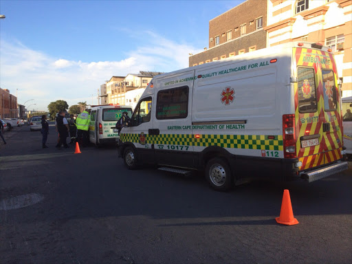 A police officer is fighting for his life in hospital after being hit by a car while trying to rescue someone.