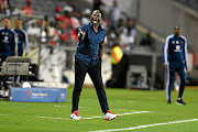 Golden Arrows  coach Steve Komphela yells instructions as Orlando Pirates counterpart Rulani Mokwena watches on Orlando Stadium this week. /  Lefty Shivambu/ gallo images