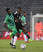 Tshegofatso Mabasa of Orlando Pirates challenged by Justice Chabalala of Bloemfontein Celtic during the DStv Premiership match between Orlando Pirates and Bloemfontein Celtic at Orlando Stadium on March 02, 2021 in Johannesburg.