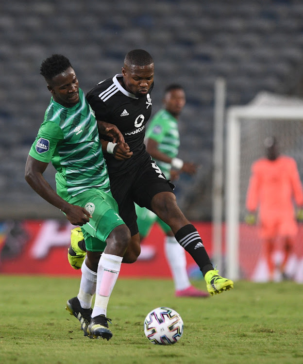 Tshegofatso Mabasa of Orlando Pirates challenged by Justice Chabalala of Bloemfontein Celtic during the DStv Premiership match between Orlando Pirates and Bloemfontein Celtic at Orlando Stadium on March 02, 2021 in Johannesburg.