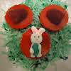 Thumbnail For Raspberry Yogurt And Raspberry Jello Over Green Died Coconut With A Bunny Candy On Top.