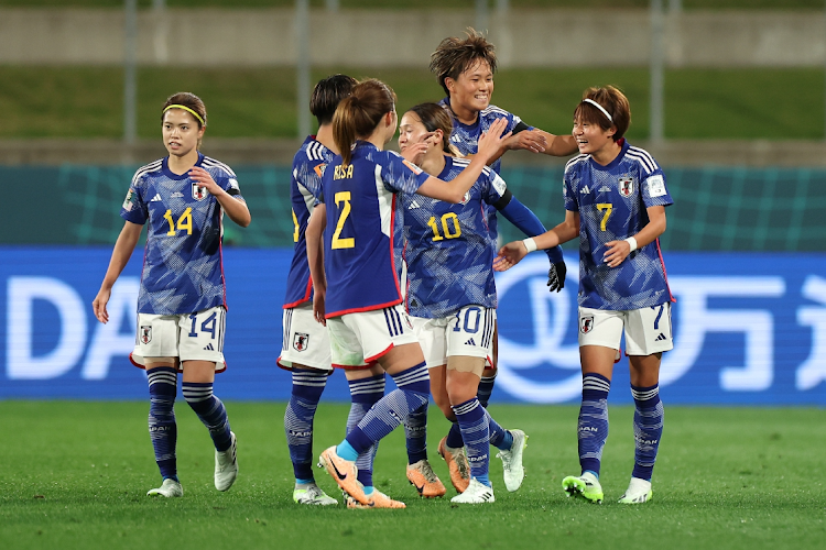 Hinata Miyazawa (right) of Japan celebrates with teammates after scoring her team's first goal during the Fifa Women's World Cup against Zambia at Waikato Stadium on July 22 2023 in New Zealand.