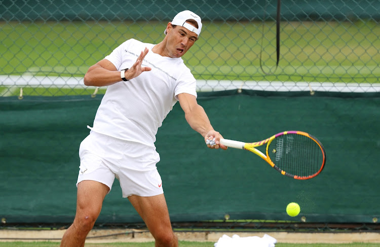 Rafael Nadal of Spain plays a forehand during a training session ahead of The Championships, Wimbledon 2022 at the All England Lawn Tennis and Croquet Club in London on June 25 2022.