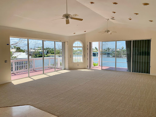 living room with canal view in this luxury property for sale in Boca Grande ($2,995,000 - 272 m²)