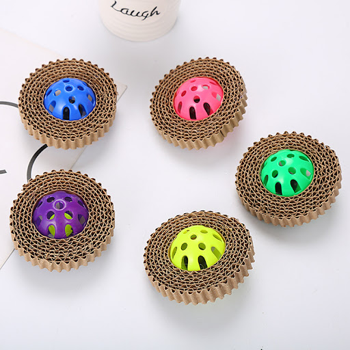 Title 2, Corrugated paper cat toy with plastic ball. Enc...