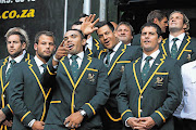 Springbok players and coaching staff greet the thousands of supporters who thronged Nelson Mandela Square, in Sandton, Johannesburg, to bid them a passionate farewell as they leave for New Zealand. Picture: ALON SKUY