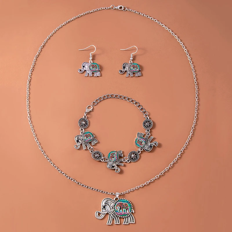 Conjunto de joias vintage étnico tailandês de prata para mulheres, com elefantes, incluindo colar, pulseira e brincos, estilo único.