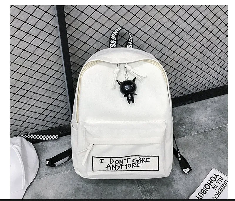 Mochila coreana de lona para estudantes, lazer ao ar livre. Design espaçoso e confortável, ideal para livros, passeios e atividades ao ar livre.