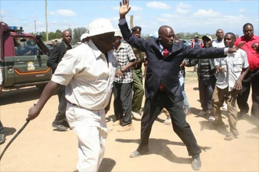 A man gets ready to whip Nyeri MCAs when they arrived at Mbiriri in Kieni East for the meeting which was addressed by Nyeri governor Nderitu Gachagua on Monday.Photo/Wambugu Kanyi