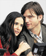 Actress Demi Moore and her husband, actor Ashton Kutcher, at a news conference in November. Rumours abound that their marriage is on the rocks Picture: BRENDAN MCDERMID/REUTERS