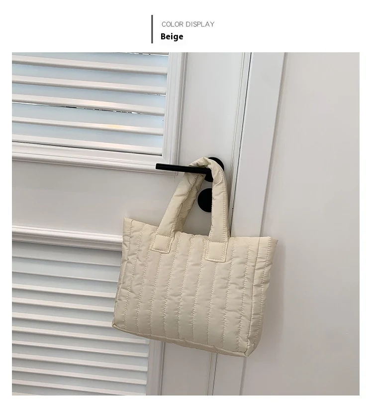 Sac à main femme à rayures douces, grande capacité, portable et tendance, parfait pour le quotidien et les voyages.