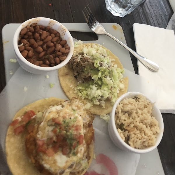 puerco verde taco, AM taco, beans and rice