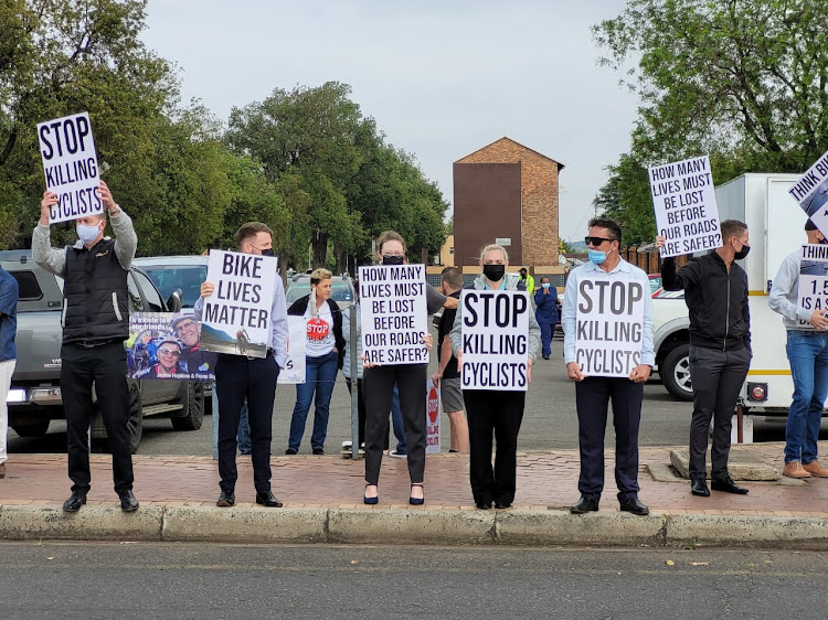 Silent protesters outside the Kempton Park magistrate's court were relieved when the taxi driver accused of killing cyclists Janine Hopkins and Frans Duys pleaded guilty to culpable homicide.