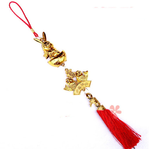 Title 12, Gold Plated Plastic Zodiac Rabbit Ornament, a p...
