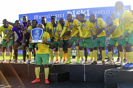 Golden Arrows reserves celebrate with MultiChoice Diski Shied trophy.