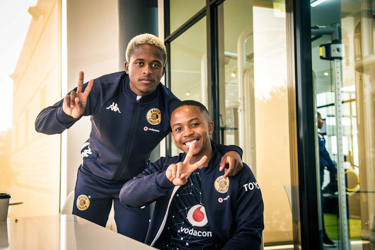 Kaizer Chiefs players Wandisile Duba and Nkosingiphile Ngcobo shows off the new tracksuits.