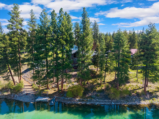 Wooded house lakeside, private dock in this luxury house for sale in Libby ($1,950,000)