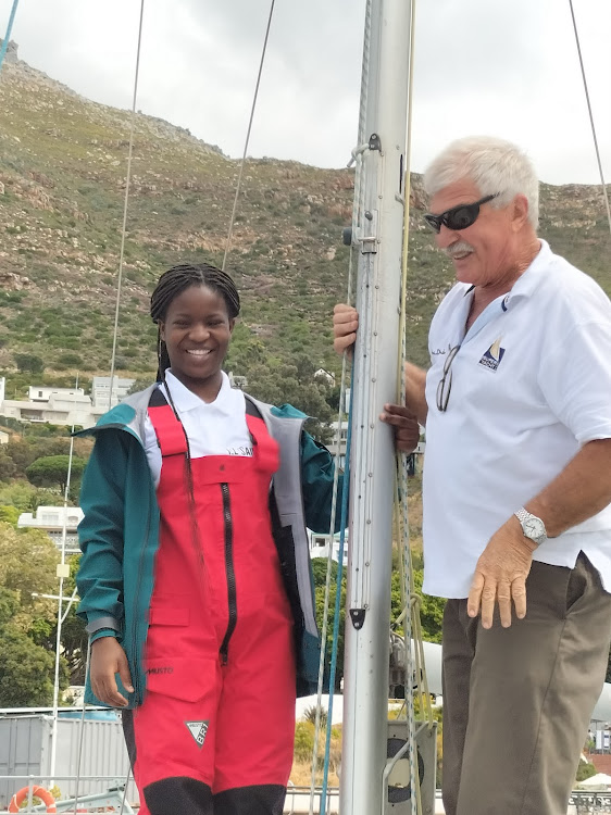 Nqobile Khuzwayo and Captain Phil Wade aboard a yacht at Simon's Town. Picture: Debbie Owen/Lawhill Maritime Centre