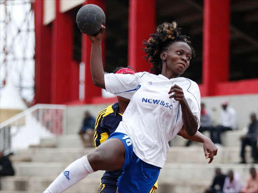 Merina Andala of Nairobi Water challenges Phoebe Mureithi of Ulinzi during their Kenya handball league match playoff s at the Nyayo National stadium/ COURTERSY