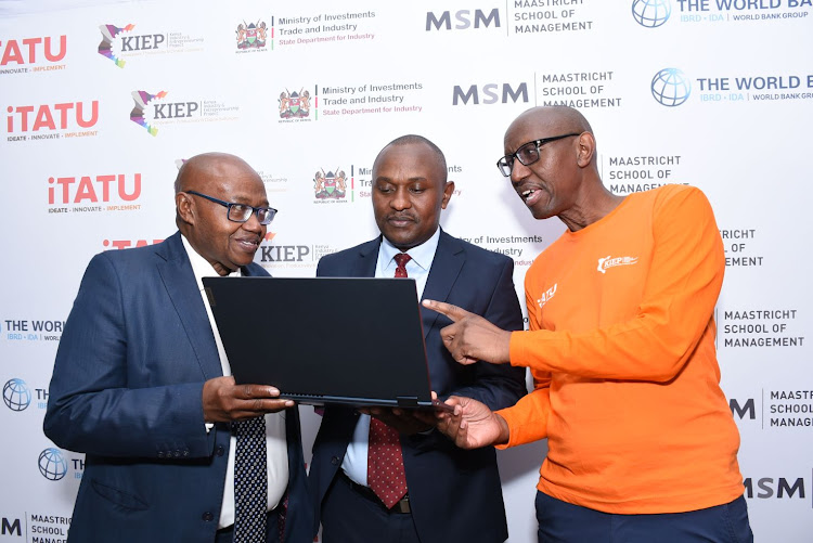 Ministry of Investments, Trade and Industry (MITI) Principal Administrative Secretary Samuel Karanja Njora, KIEP project coordinator Phillip Maitha and iTATU team lead Julius Gatune during the launch of the iTATU, industry-academia platform in Nairobi.