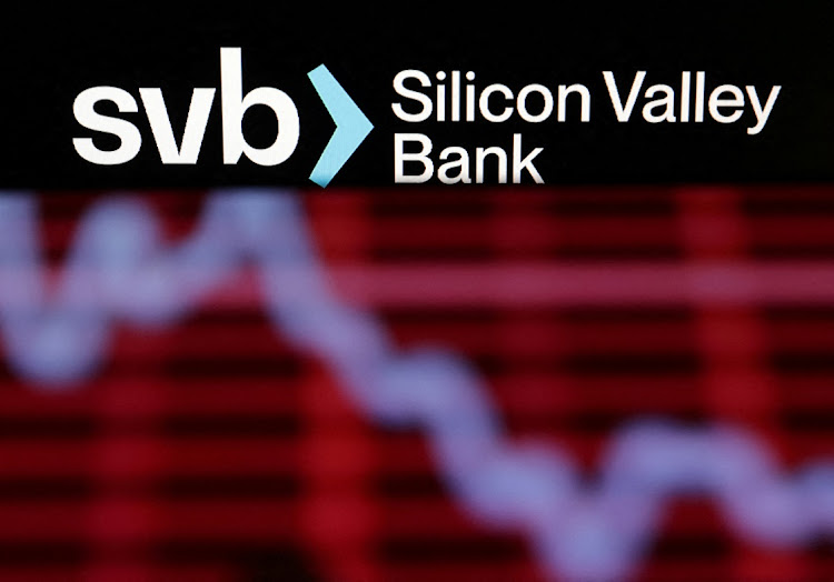 The Silicon Valley Bank logo and decreasing stock graph are seen in this illustration. File picture :DADO RUVIC/REUTERS