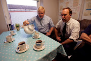 Britain's Prime Minister Boris Johnson and Health Secretary Matt Hancock.