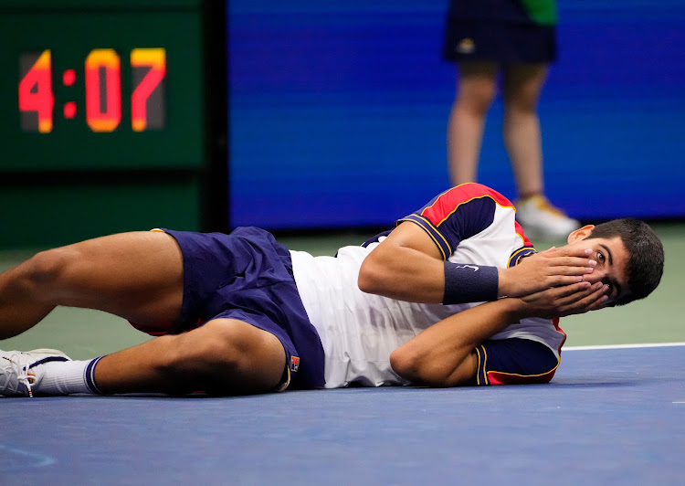 A file photo of Carlos Alcaraz in disbelief after beating Stefanos Tsitsipas on day five of the 2021 US Open tennis tournament at USTA Billie King National Tennis Center.