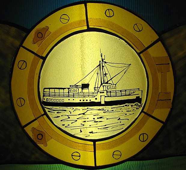 2011: - a stained-glass display inside the office of Lady Rose Marine