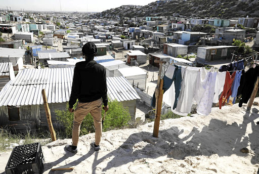 Bordering False Bay and built on the sands and dunes of the Cape Flats, the densely populated and informal part of Khayelitsha where there's hardly room to swing a cat let alone keep to social distancing.