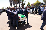 SAPS members as pallbearers at warrant officer Dalmain Morris' funeral