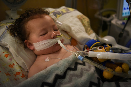 Adrian James, 2, who tested positive for the coronavirus disease (Covid-19), breathes with the help of a ventilator at SSM Health Cardinal Glennon Children's Hospital in St. Louis, Missouri, US, October 5, 2021.