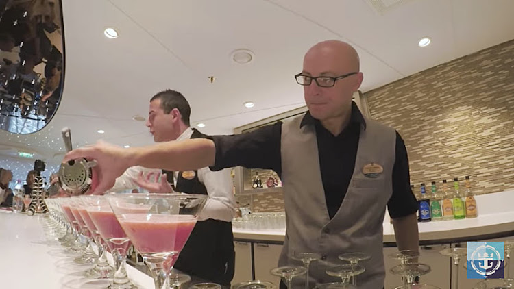 Mixologists do their thing at Harmony of the Seas’ Wonderland.