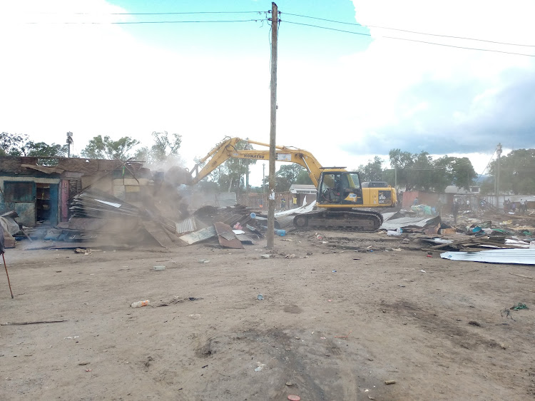 Bulldozers bring down all houses in in KCC village in Naivasha, clearing all structures on railways land for railway construction. Demolition Sunday