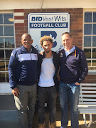 Newly signed Daylon Claason pose for photographs flanked by Bidvest Wits officials on Thursday 29 June 2017. 