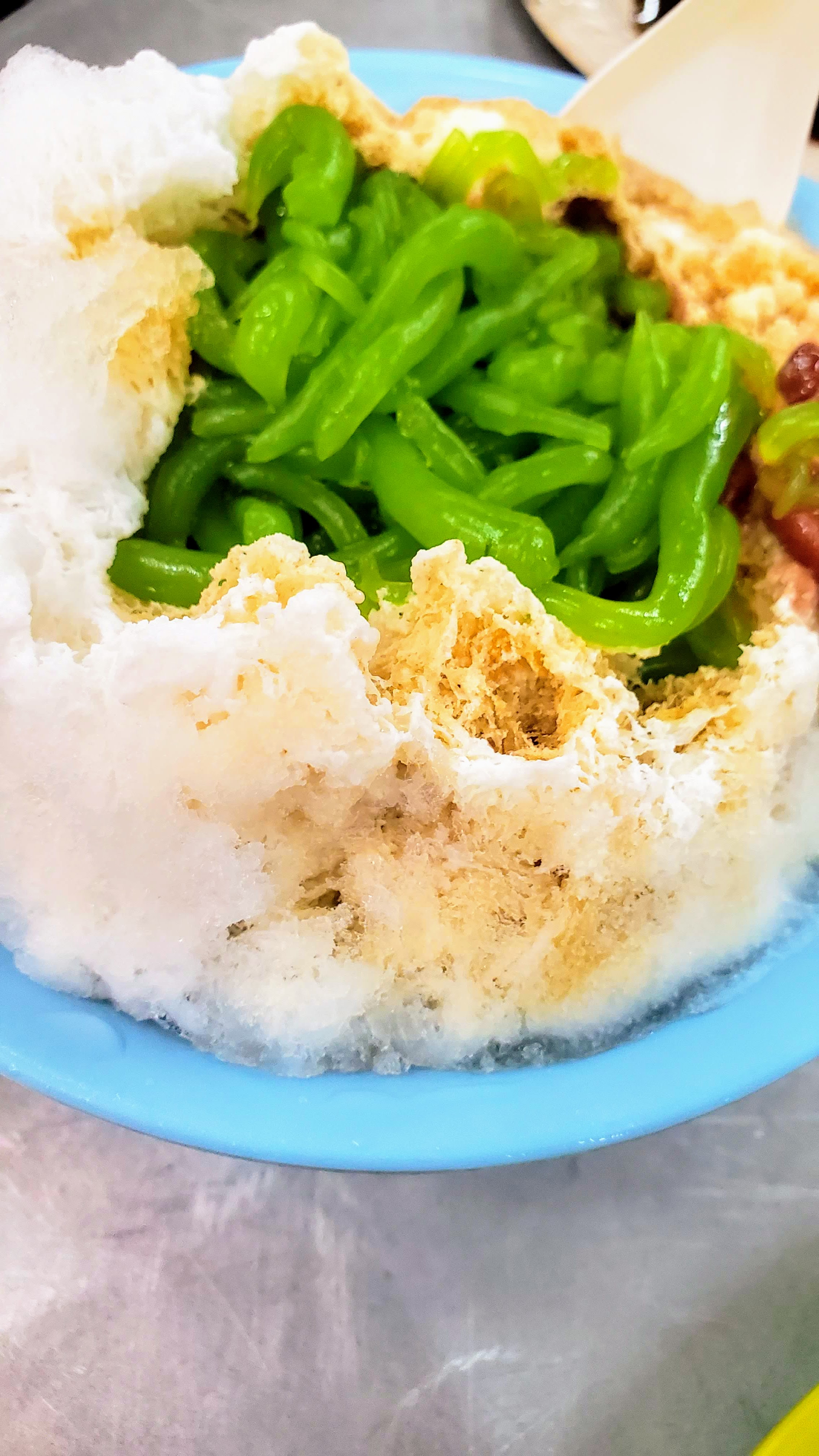 Food Highlights of Penang: Cendol, aka a dessert made with shaved ice, coconut milk, jelly noodles, and palm sugar. Other ingredients like red beans, glutinous rice, grass jelly, and creamed corn may also be added.