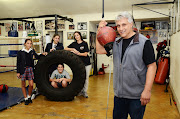 Alan Toweel of the Alan Toweel Boxing Gym around his house where he has turned a garage into a tiny gym to develop young talent. Here with his family Julia, Leila, Alan Jnr and wife Marisa.
