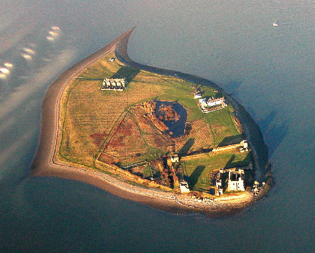 An aerial view of Piel Island off the southern tip of the Furness peninsula in Cumbria, England. In the foreground is the shell of the Piel Castle, built by monks of Furness Abbey in the fourteenth century.