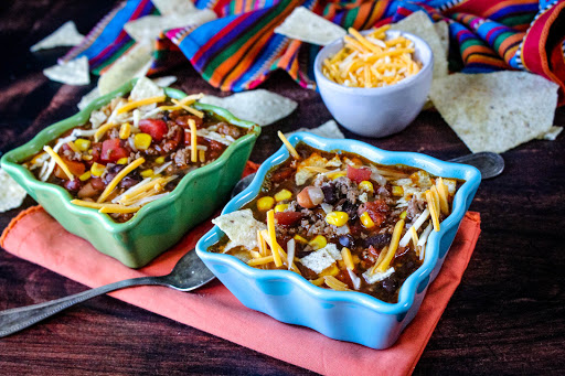 8 Can Taco Soup ladled into two bowls.