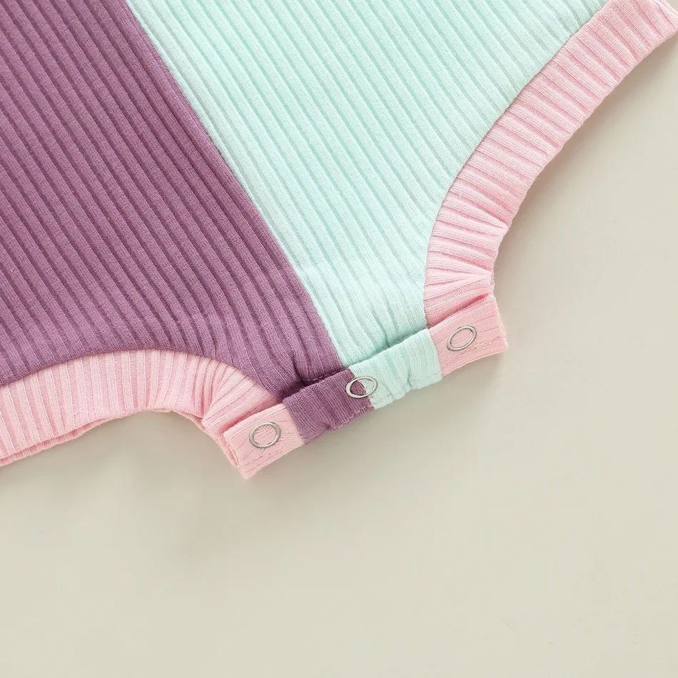 Combinaison une pièce à manches longues, col rond, assortiment de couleurs simple, confort et style pour toutes occasions.