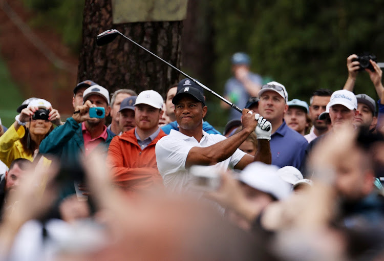 Tiger Woods of the US tees off on the 17th during a practice round ahead of the masters at Augusta National Golf Club