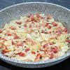 Thumbnail For Bacon And Onions Cooking In A Skillet.