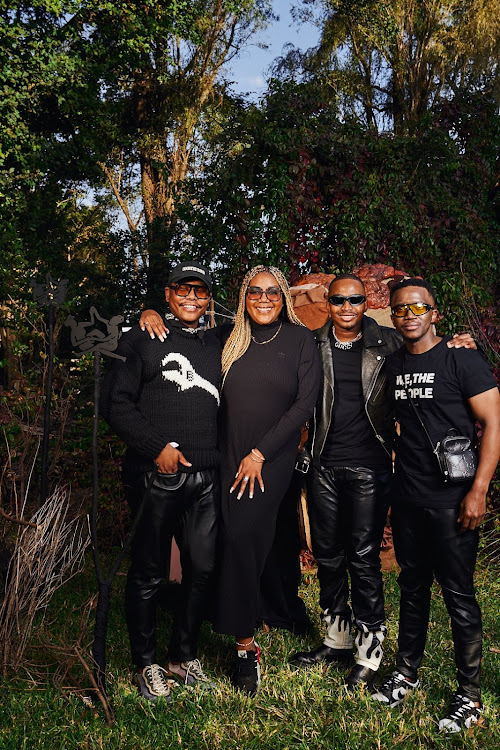 Musician Langa Mavuso, Lerato Sengadi, Trevor Stuurman and Dr. Sivuyile Madikana at Nirox Sculpture Park.